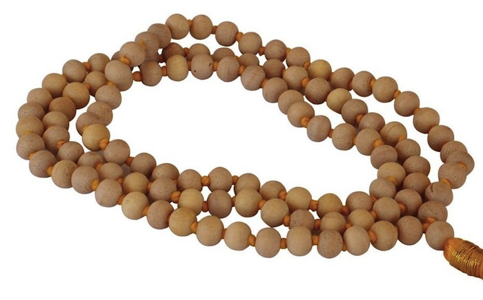 Margaret Nichols gives out tulsi mala beads blessed at the Oneness University when she teaches in NYC. Read more at Thenuminous.net!