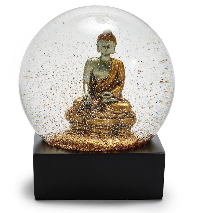 Golden Buddha snow globe from ABC Carpet & Home featured on Thenuminous.net