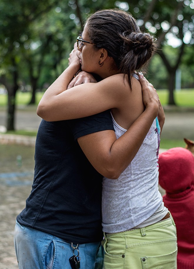 empowered action people hugging by Katya Volpato on The Numinous